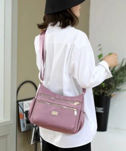 Cartera Morral Sofi con múltiples bolsillos y correa regulable, diseño urbano y funcional