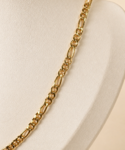 Cadena de acero quirúrgico dorado tipo Fígaro 3-1 de 60 cm.