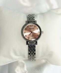 Reloj pulsera dama plateado fondo rosado