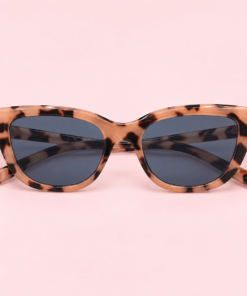 Lente de sol unisex VELA de formato geométrico con diseño moderno y líneas definidas animal print camel