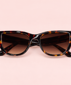 Lente de sol unisex VELA de formato geométrico con diseño moderno y líneas definidas carey