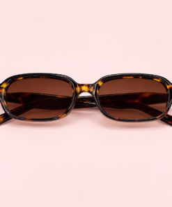 Lente de sol unisex NILO de formato rectangular suavizado con diseño moderno carey