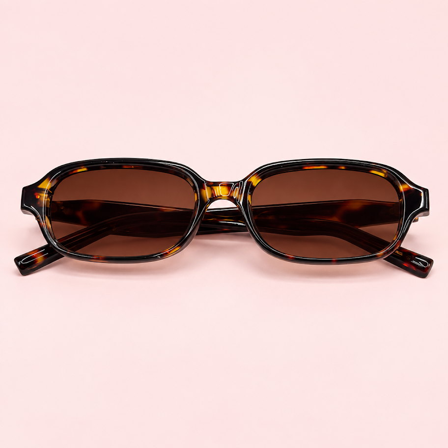 Lente de sol unisex NILO de formato rectangular suavizado con diseño moderno carey
