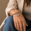 Pulsera de acero quirúrgico con cadena de eslabones y dije decorativo en acabado brillante corazón olateado