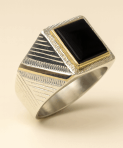 Anillo plara y oro con piedra negra