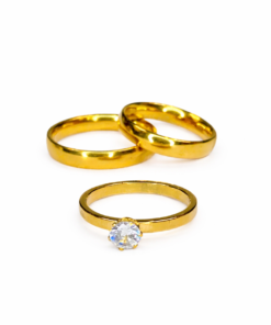 Juego de alianzas en acero dorado con cintillo