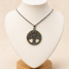 Conjunto en acero quirúrgico con dije árbol de la vida combinado en tonos plateado y dorado