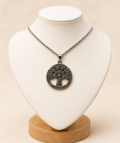 Conjunto en acero quirúrgico con dije árbol de la vida combinado en tonos plateado y dorado