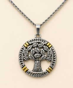 Conjunto en acero quirúrgico con dije árbol de la vida combinado en tonos plateado y dorado