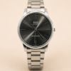 Reloj Q&Q de hombre con malla metálica plateada y esfera negra