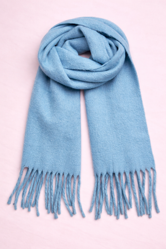 Bufanda de tejido suave con flecos, ideal para looks abrigados de otoño e invierno, celeste