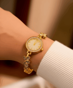 Reloj dorado mariposa y brillos dorado