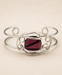 Brazalete de alpaca con piedra de color entrelazada violeta