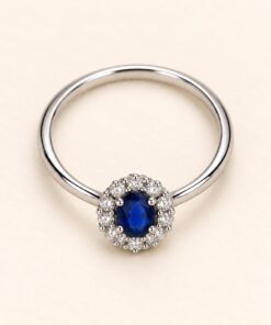 Anillo de Plata 925 con circonia azul oval central y circonias blancas alrededor